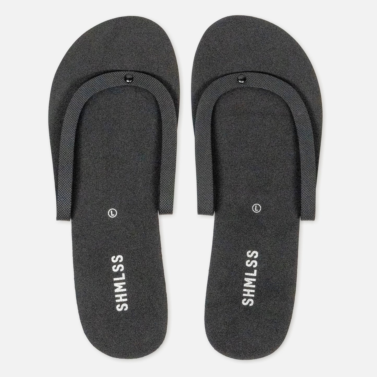 Non-slip tread and reinforced rivet on SHMLSS™ foldable flip-flops for heels - Top View