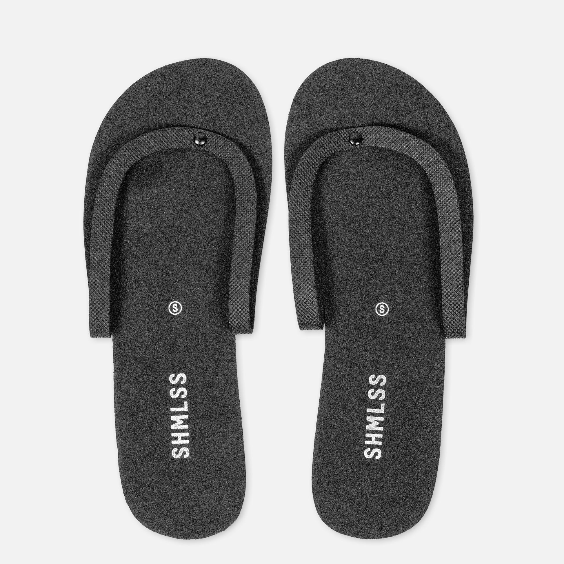 Non-slip tread and reinforced rivet on SHMLSS™ foldable flip-flops for heels - Top View